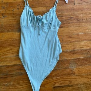 Light teal body suit